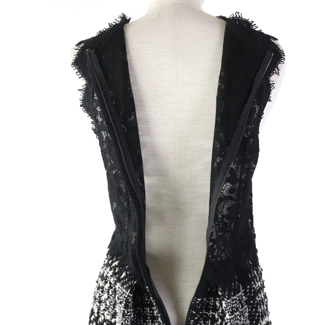 DOLCE&GABBANA ensemble Main: 78% wool, Main: 18% nylon, Main: 3% mohair, Main: 3% alpaca, Lining: 96% silk, : 3% alpaca Lining: 100% polyester black Women (Top) 36, (Bottom) 38 Used Authentic