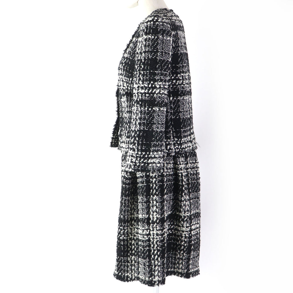 DOLCE&GABBANA ensemble Main: 78% wool, Main: 18% nylon, Main: 3% mohair, Main: 3% alpaca, Lining: 96% silk, : 3% alpaca Lining: 100% polyester black Women (Top) 36, (Bottom) 38 Used Authentic