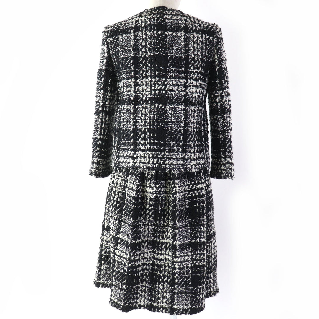 DOLCE&GABBANA ensemble Main: 78% wool, Main: 18% nylon, Main: 3% mohair, Main: 3% alpaca, Lining: 96% silk, : 3% alpaca Lining: 100% polyester black Women (Top) 36, (Bottom) 38 Used Authentic