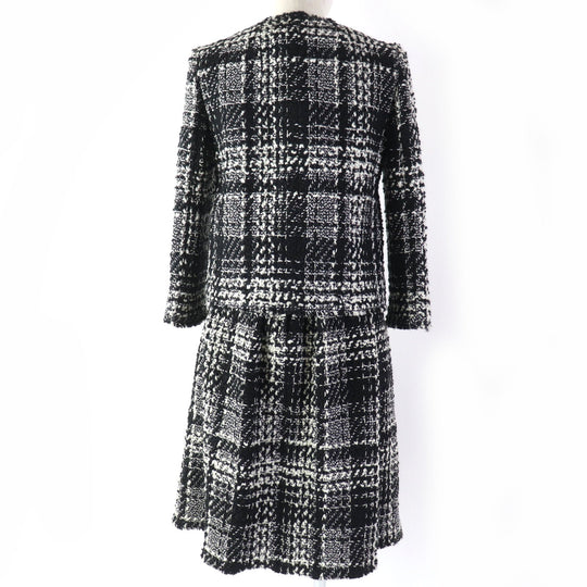 DOLCE&GABBANA ensemble Main: 78% wool, Main: 18% nylon, Main: 3% mohair, Main: 3% alpaca, Lining: 96% silk, : 3% alpaca Lining: 100% polyester black Women (Top) 36, (Bottom) 38 Used Authentic