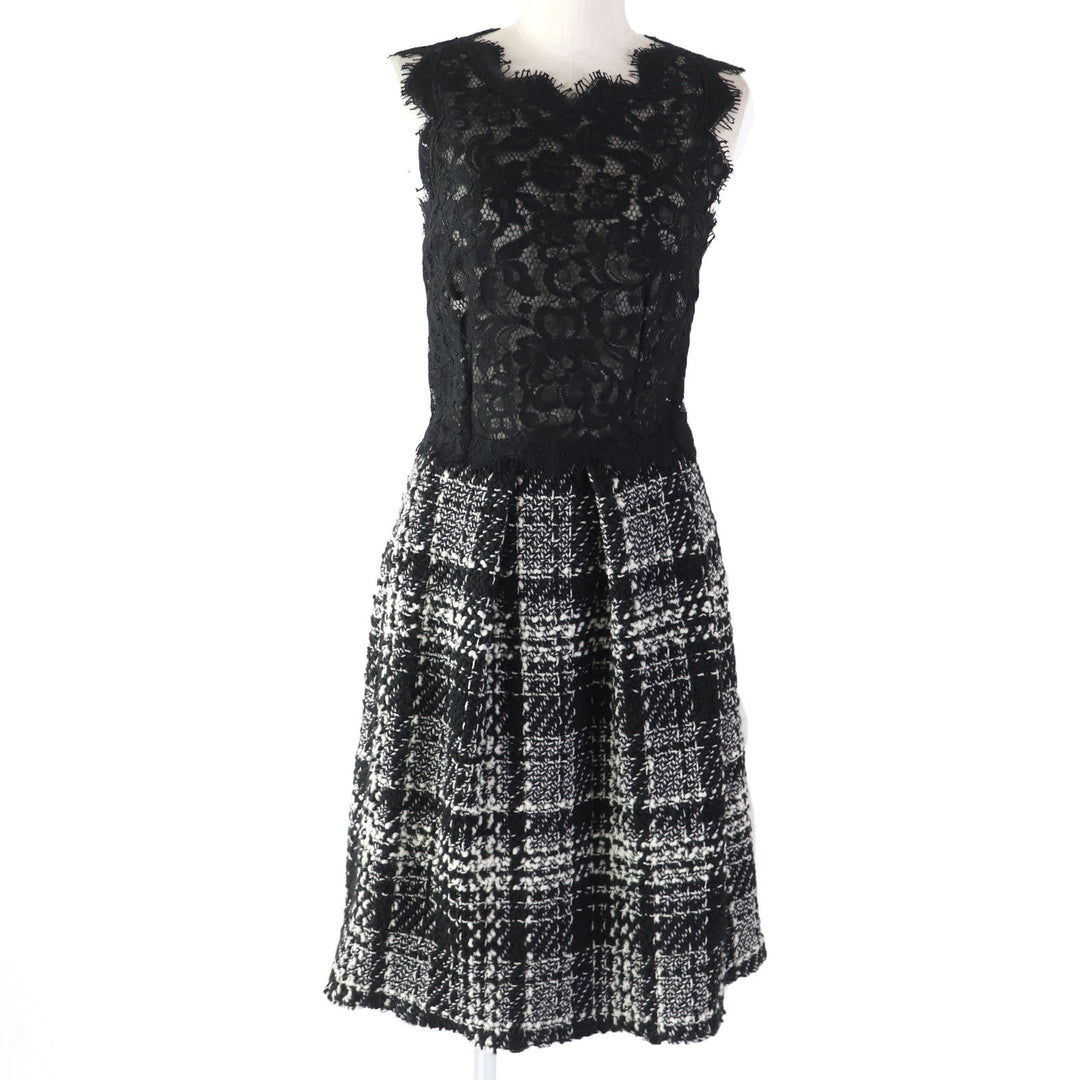 DOLCE&GABBANA ensemble Main: 78% wool, Main: 18% nylon, Main: 3% mohair, Main: 3% alpaca, Lining: 96% silk, : 3% alpaca Lining: 100% polyester black Women (Top) 36, (Bottom) 38 Used Authentic