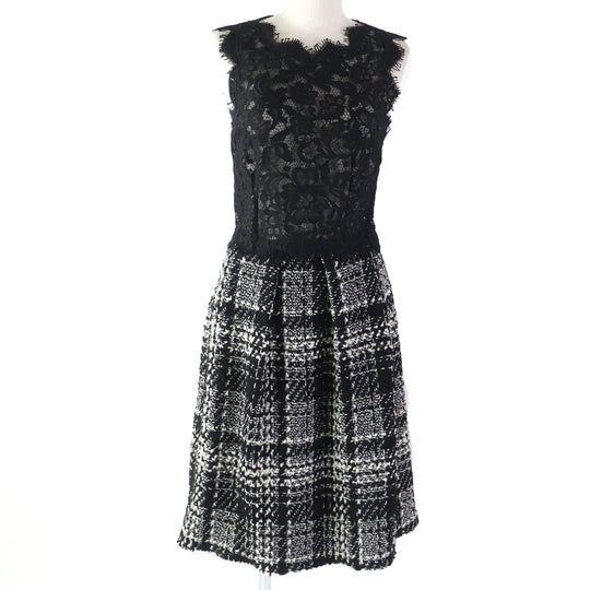 DOLCE&GABBANA ensemble Main: 78% wool, Main: 18% nylon, Main: 3% mohair, Main: 3% alpaca, Lining: 96% silk, : 3% alpaca Lining: 100% polyester black Women (Top) 36, (Bottom) 38 Used Authentic