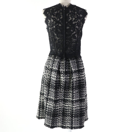 DOLCE&GABBANA ensemble Main: 78% wool, Main: 18% nylon, Main: 3% mohair, Main: 3% alpaca, Lining: 96% silk, : 3% alpaca Lining: 100% polyester black Women (Top) 36, (Bottom) 38 Used Authentic