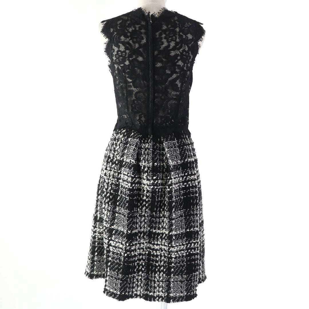 DOLCE&GABBANA ensemble Main: 78% wool, Main: 18% nylon, Main: 3% mohair, Main: 3% alpaca, Lining: 96% silk, : 3% alpaca Lining: 100% polyester black Women (Top) 36, (Bottom) 38 Used Authentic