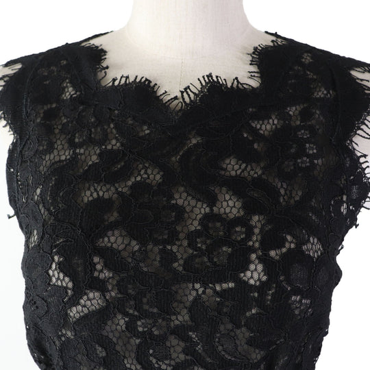 DOLCE&GABBANA ensemble Main: 78% wool, Main: 18% nylon, Main: 3% mohair, Main: 3% alpaca, Lining: 96% silk, : 3% alpaca Lining: 100% polyester black Women (Top) 36, (Bottom) 38 Used Authentic