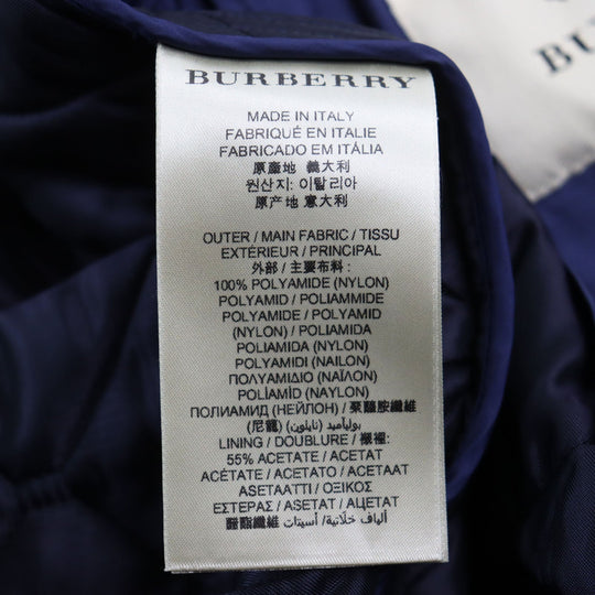 Burberry Prorsum Blouson Outer: 100% polyamide (nylon), Lining: 55% acetate, Lining: 45% viscose (rayon), Filling: 100% polyester, Part: 90% cotton, : 8% polyamide (nylon), : 2% elastane, Part: Lamb leather blue mens M Used Authentic