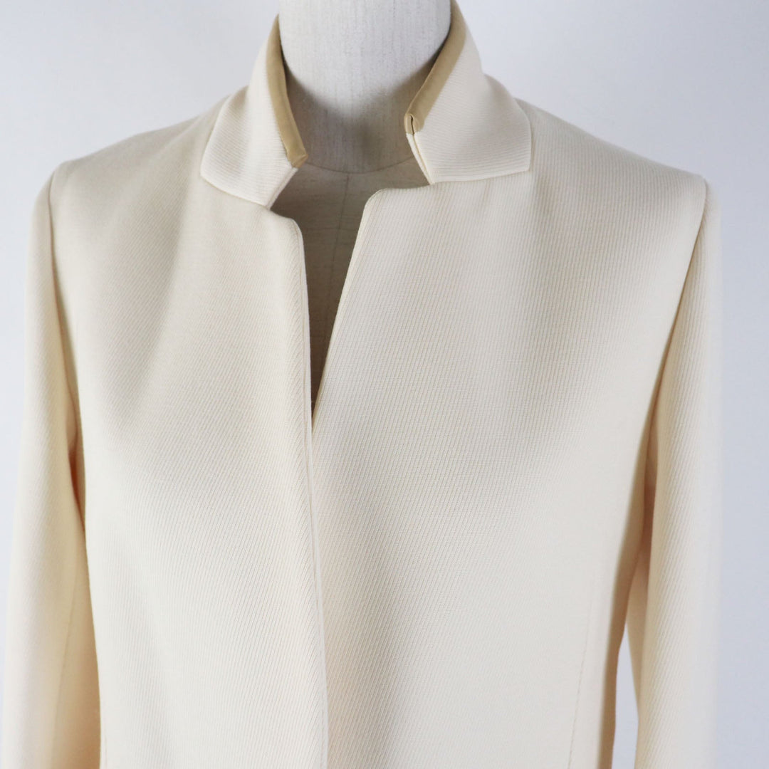 HERMES Other outerwear Outer: 95% wool, Outer: 5% cashmere, Lining: 65% rayon, Lining: 35% silk, Part: sheepskin Ivory beige Prefall collection Women 36 Used Authentic
