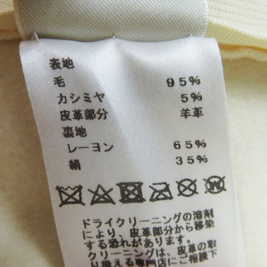 HERMES Other outerwear Outer: 95% wool, Outer: 5% cashmere, Lining: 65% rayon, Lining: 35% silk, Part: sheepskin Ivory beige Prefall collection Women 36 Used Authentic