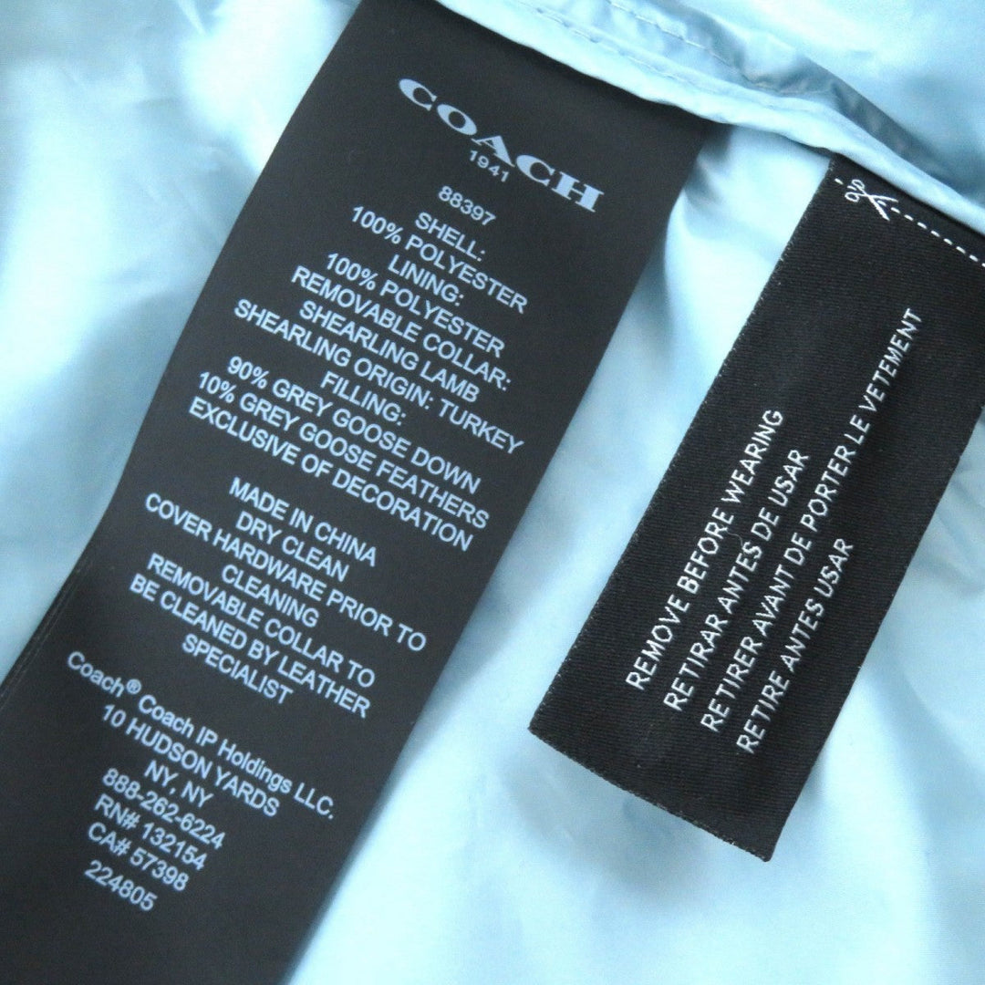 COACH Down vest 88397 Main: 100% polyester, Lining: 100% polyester, Fur: Lamb fur, Filling: 90% down, Filling: 10% feather Light blue Women 4 Used Authentic