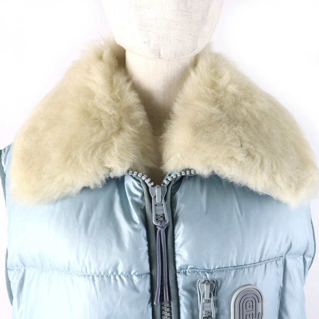 COACH Down vest 88397 Main: 100% polyester, Lining: 100% polyester, Fur: Lamb fur, Filling: 90% down, Filling: 10% feather Light blue Women 4 Used Authentic