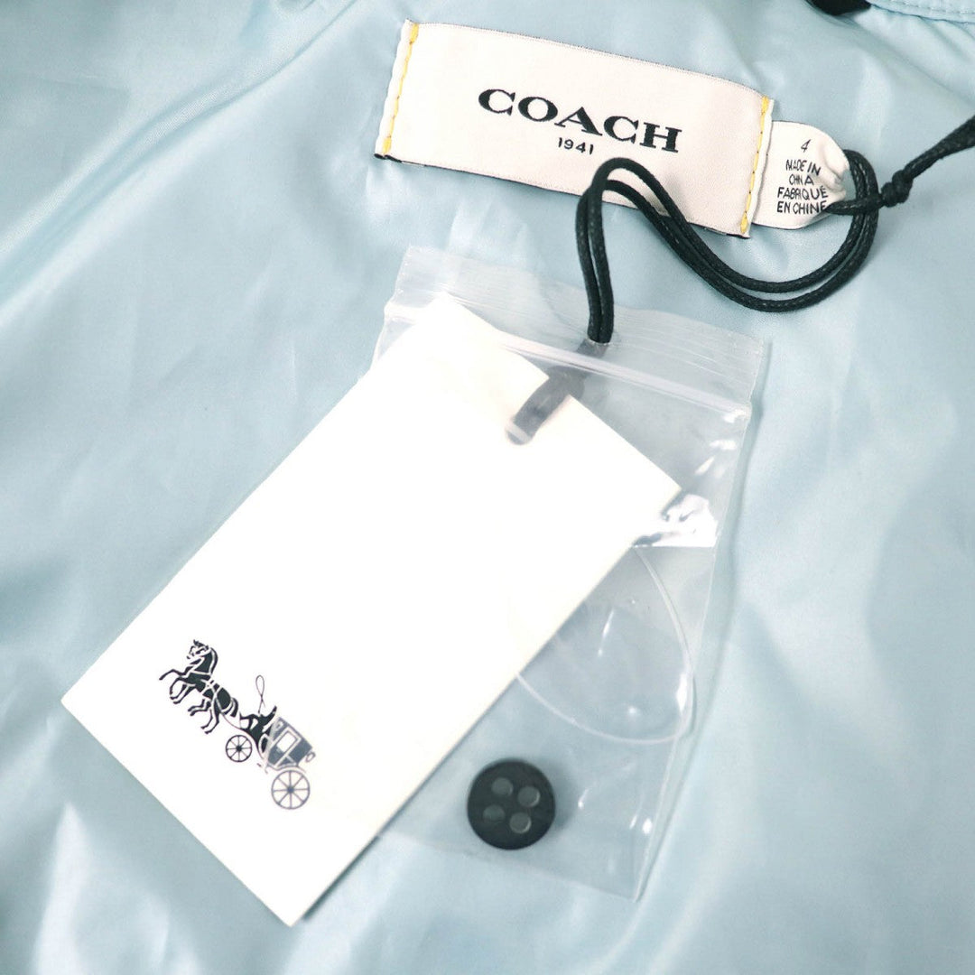 COACH Down vest 88397 Main: 100% polyester, Lining: 100% polyester, Fur: Lamb fur, Filling: 90% down, Filling: 10% feather Light blue Women 4 Used Authentic