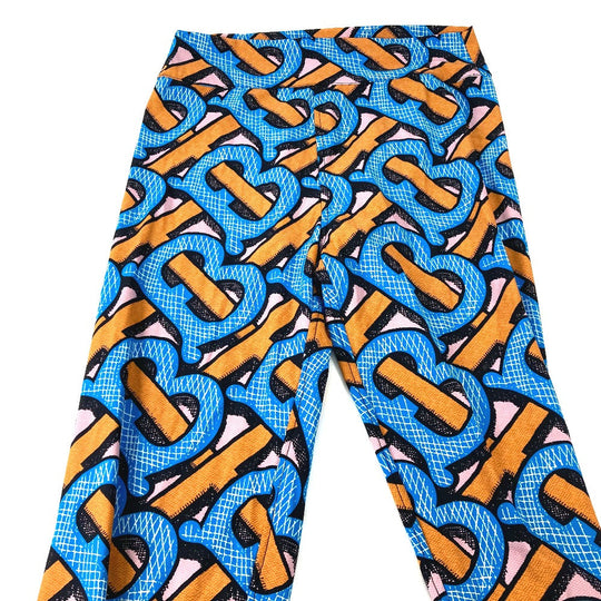 BURBERRY Pants 8033182 Nylon Orange apparel long pants TB leggings Women M Used Authentic