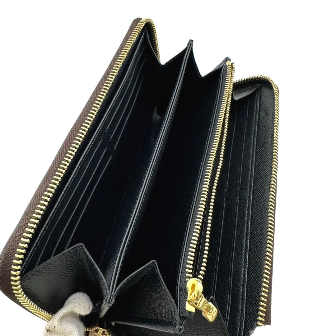 LOUIS VUITTON Long Wallet Purse M69353 Monogram canvas Brown Giant reverse Monogram Zippy wallet mens(Unisex) Used Authentic