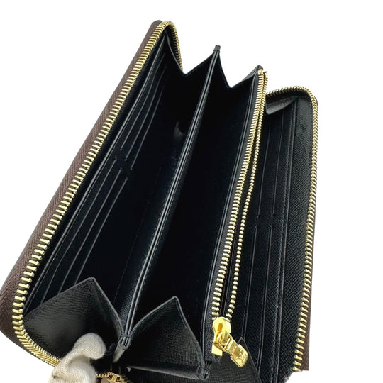 LOUIS VUITTON Long Wallet Purse M69353 Monogram canvas Brown Giant reverse Monogram Zippy wallet mens(Unisex) Used Authentic