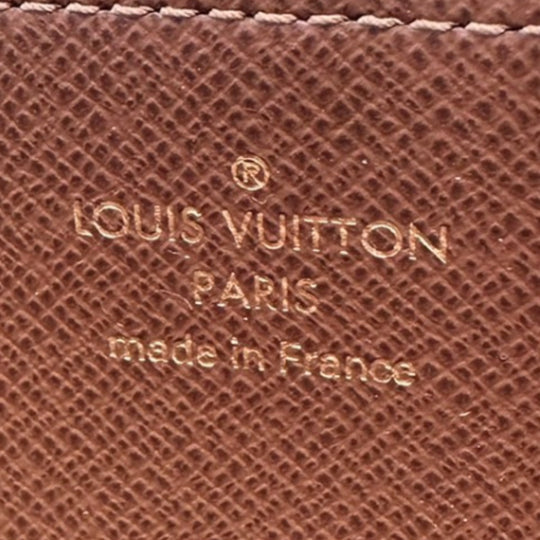 LOUIS VUITTON Long Wallet Purse M42616 Monogram canvas Brown Zip Around Monogram Zippy wallet mens(Unisex) Used Authentic