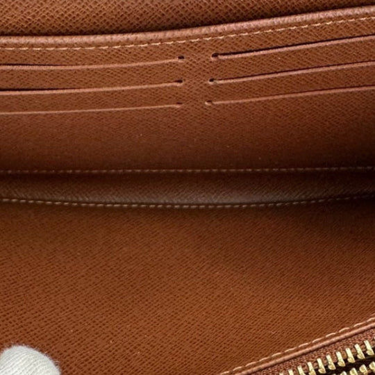 LOUIS VUITTON Long Wallet Purse M42616 Monogram canvas Brown Zip Around Monogram Zippy wallet mens(Unisex) Used Authentic