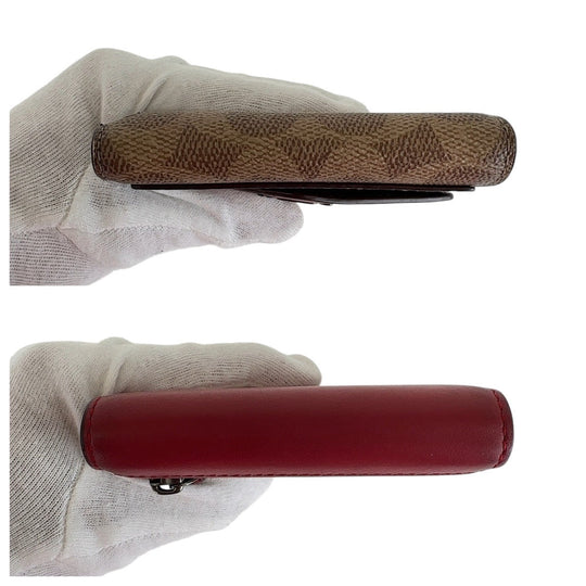 COACH Tri-fold wallet PVC Red Signature