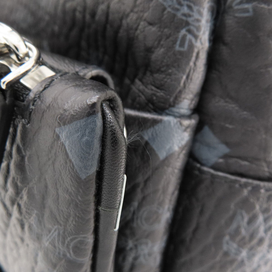 MCM Backpack PVC black logo Women Used Authentic