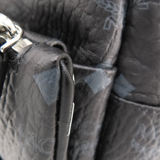 MCM Backpack PVC black logo Women Used Authentic