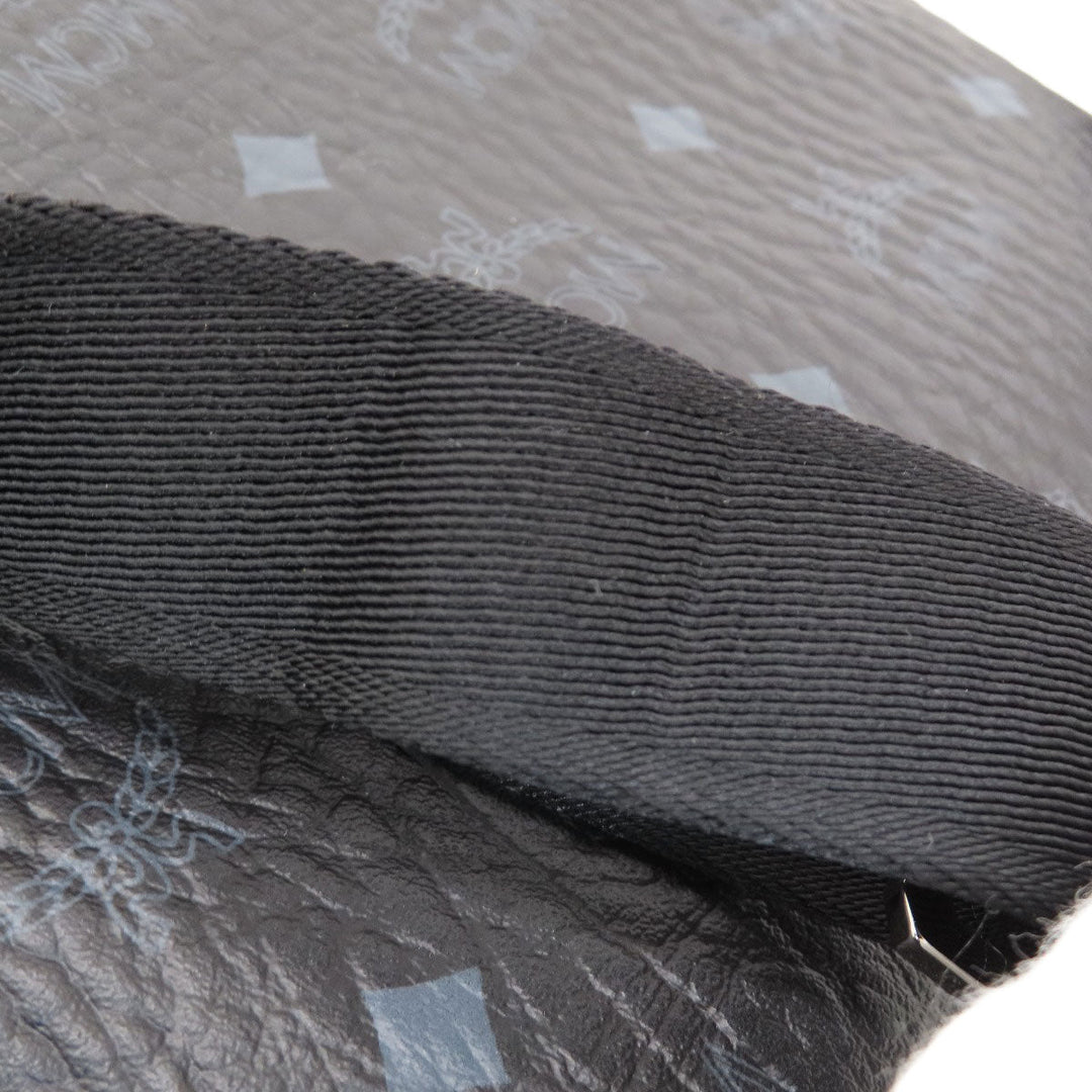 MCM Backpack PVC black logo Women Used Authentic