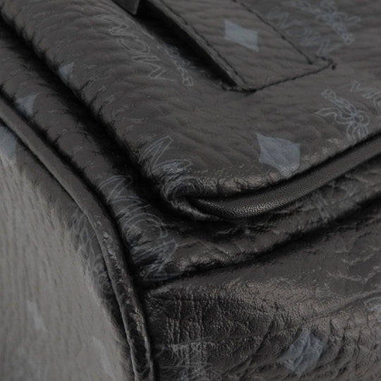 MCM Backpack PVC black logo Women Used Authentic