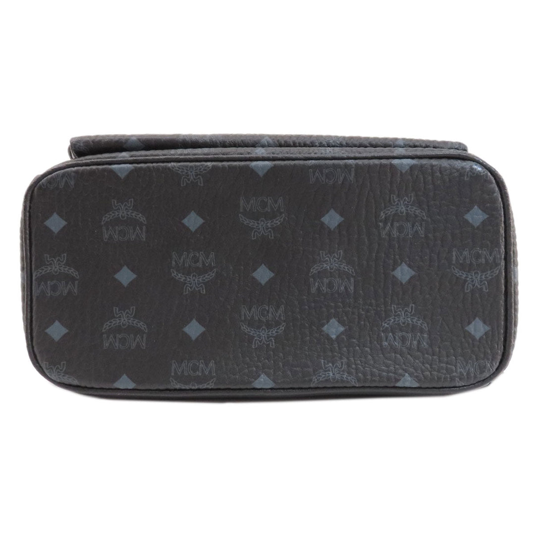 MCM Backpack PVC black logo Women Used Authentic