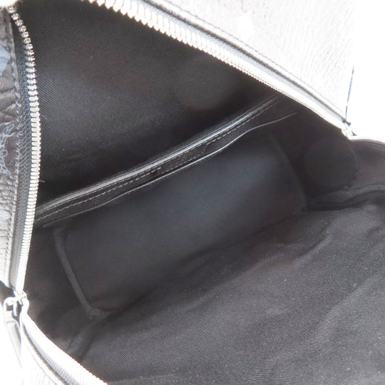 MCM Backpack PVC black logo Women Used Authentic
