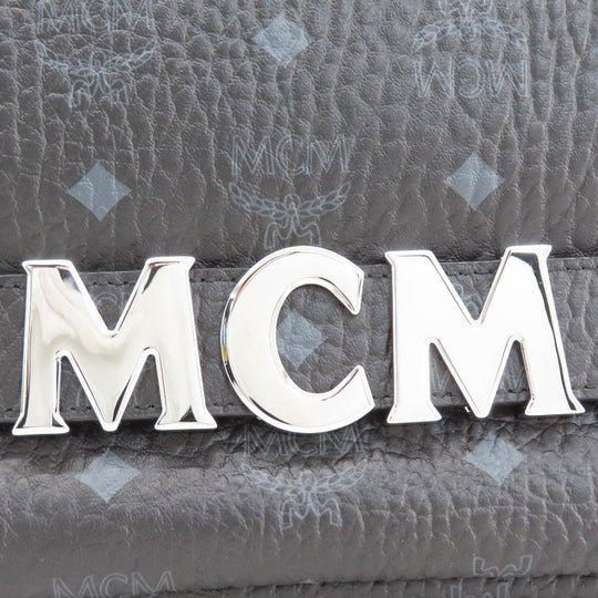 MCM Backpack PVC black logo Women Used Authentic