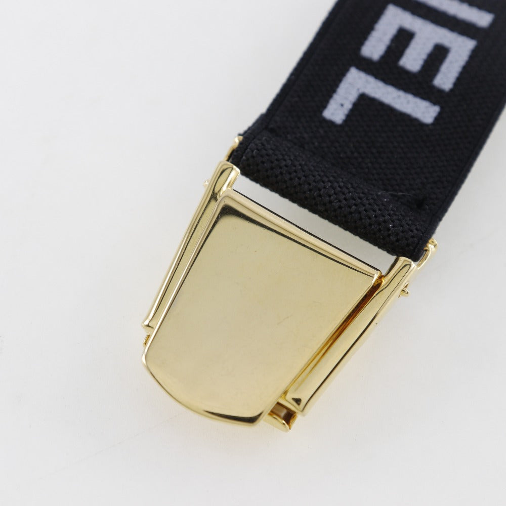 CHANEL Other miscellaneous goods Rubber, Plated Gold black Clip logo Arm band Women Used Authentic