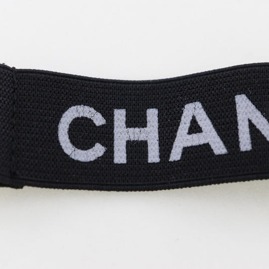 CHANEL Other miscellaneous goods Rubber, Plated Gold black Clip logo Arm band Women Used Authentic