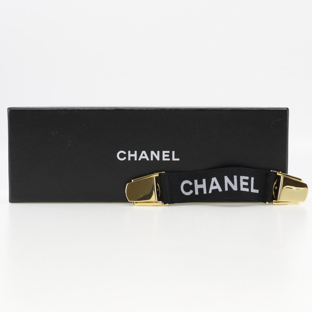 CHANEL Other miscellaneous goods Rubber, Plated Gold black Clip logo Arm band Women Used Authentic