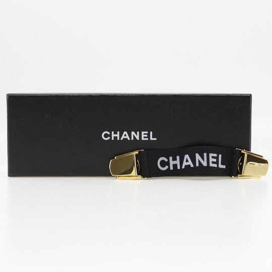CHANEL Other miscellaneous goods Rubber, Plated Gold black Clip logo Arm band Women Used Authentic