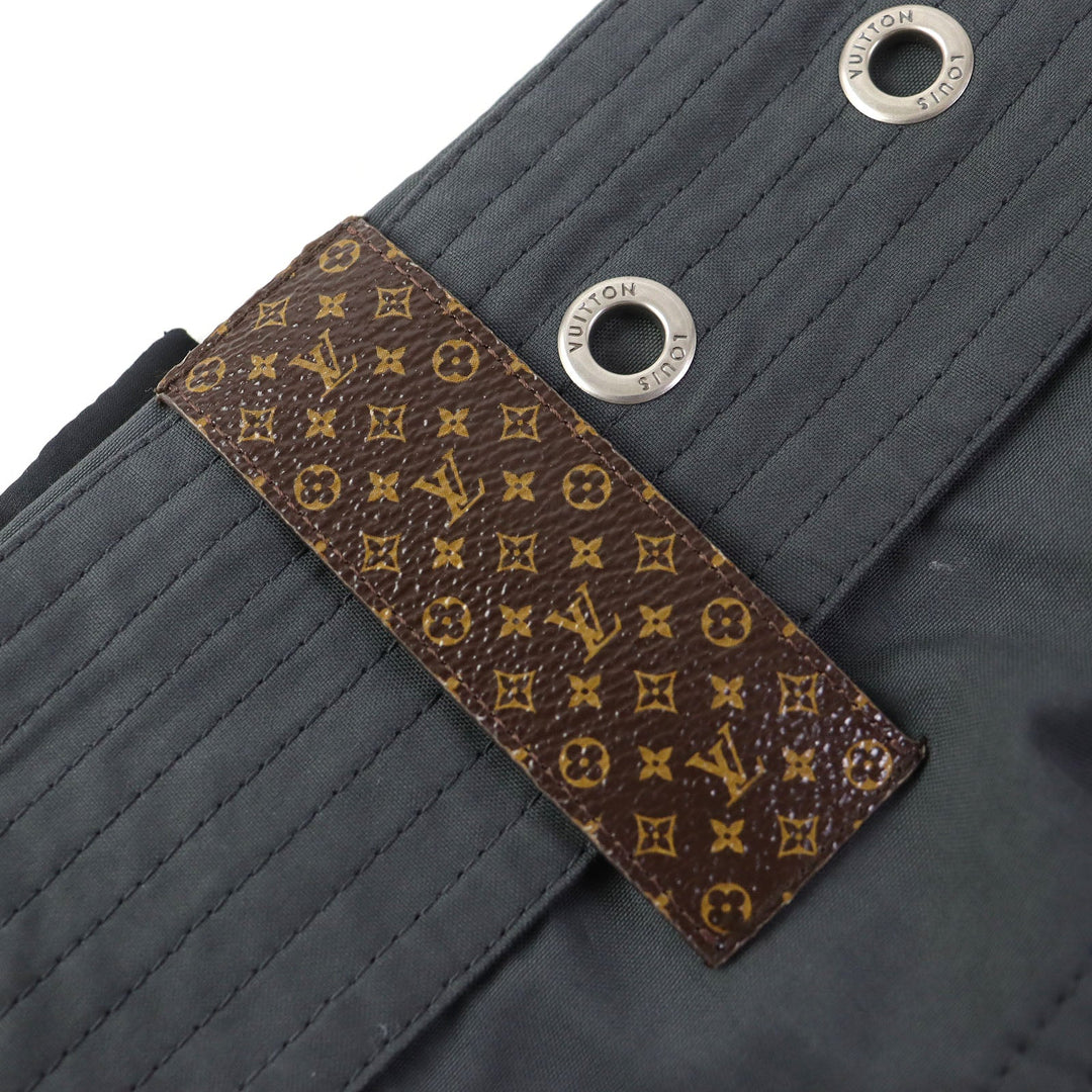 LOUIS VUITTON cargo pants Outer: 66% lyocell, 34% cotton; Lining: 100% cotton; Synthetic leather: 100% polyester (PVC coated) Black type Women 36 Used Authentic