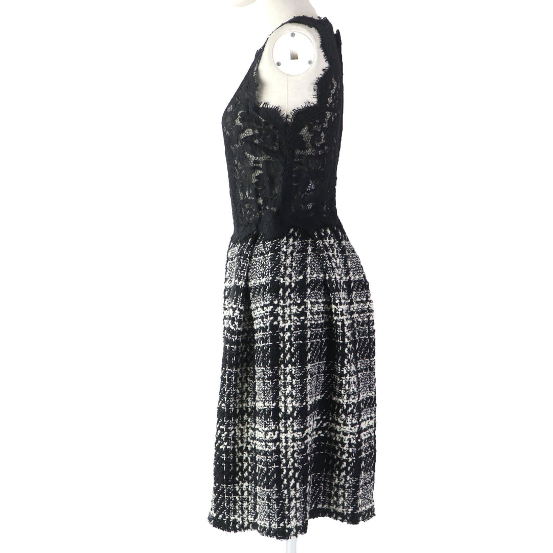 DOLCE&GABBANA ensemble Main: 78% wool, Main: 18% nylon, Main: 3% mohair, Main: 3% alpaca, Lining: 96% silk, : 3% alpaca Lining: 100% polyester black Women (Top) 36, (Bottom) 38 Used Authentic