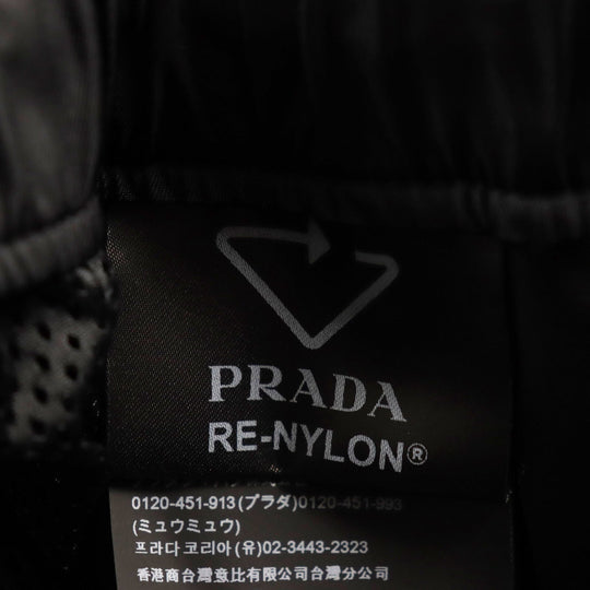 PRADA Pants SPH55 Outer: 100% recycled polyamide, Lining: 100% polyester, Partially: cowhide black Re Bylon triangle logo track pants mens M Used Authentic