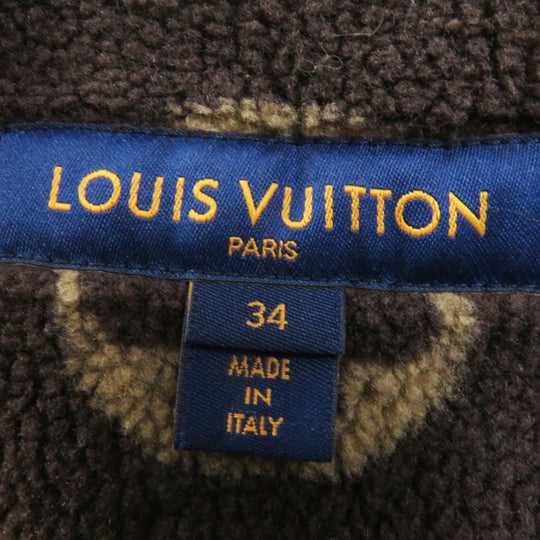 LOUIS VUITTON Down vest Outer: 100% cotton, Lining: 75% polyester, Lining: 25% acrylic, Filling: 90% down, Filling: 10% feather, Part: PVC Light yellow Women 34 Used Authentic