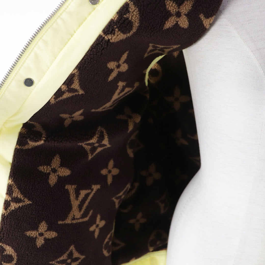 LOUIS VUITTON Down vest Outer: 100% cotton, Lining: 75% polyester, Lining: 25% acrylic, Filling: 90% down, Filling: 10% feather, Part: PVC Light yellow Women 34 Used Authentic