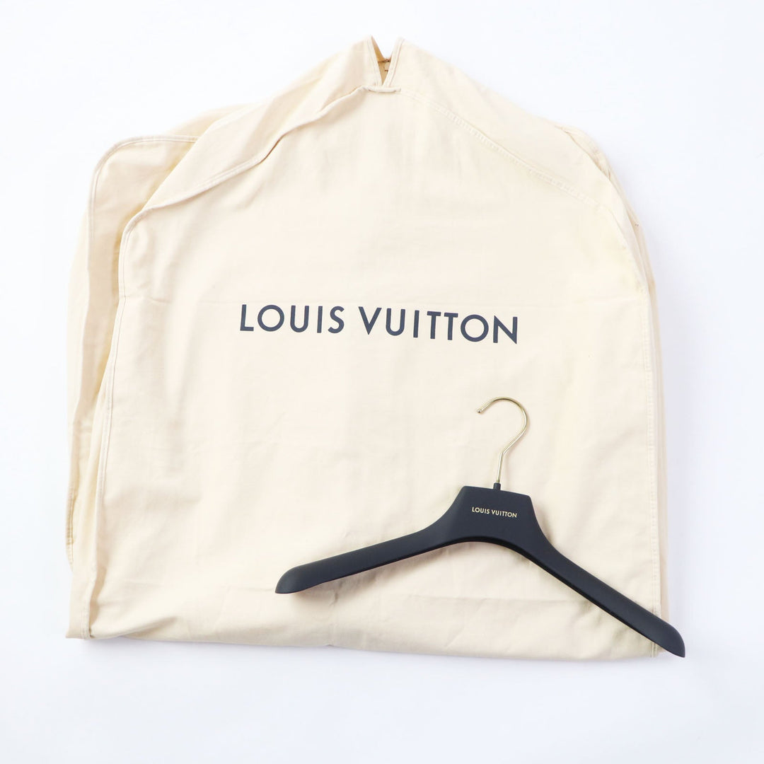 LOUIS VUITTON Down vest Outer: 100% cotton, Lining: 75% polyester, Lining: 25% acrylic, Filling: 90% down, Filling: 10% feather, Part: PVC Light yellow Women 34 Used Authentic