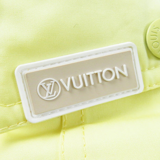 LOUIS VUITTON Down vest Outer: 100% cotton, Lining: 75% polyester, Lining: 25% acrylic, Filling: 90% down, Filling: 10% feather, Part: PVC Light yellow Women 34 Used Authentic