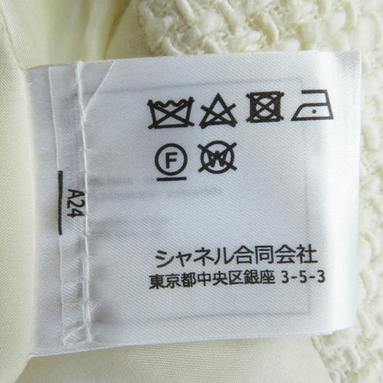 CHANEL Tweed skirt P62054 Outer: 94% wool, Outer: 6% polyamide (nylon), Lining: 100% silk Ecru/White Women 34 Used Authentic