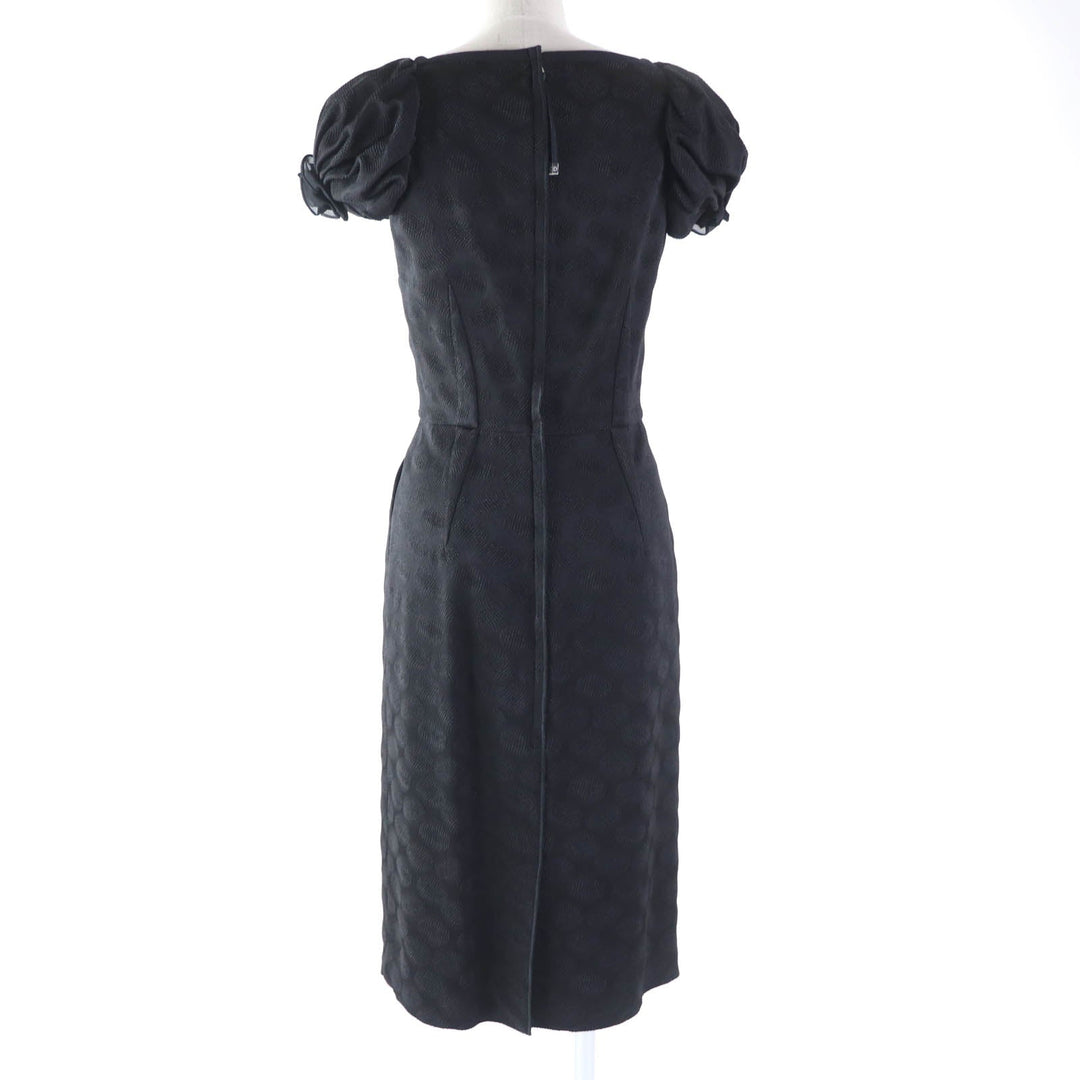 DOLCE&GABBANA one piece Outer: 79% acetate, Outer: 18% nylon, Outer: 3% elastane (polyurethane), Lining: 78% acetate, Lining: 16% nylon, Lining: 6% elastane black Women 38 Used Authentic