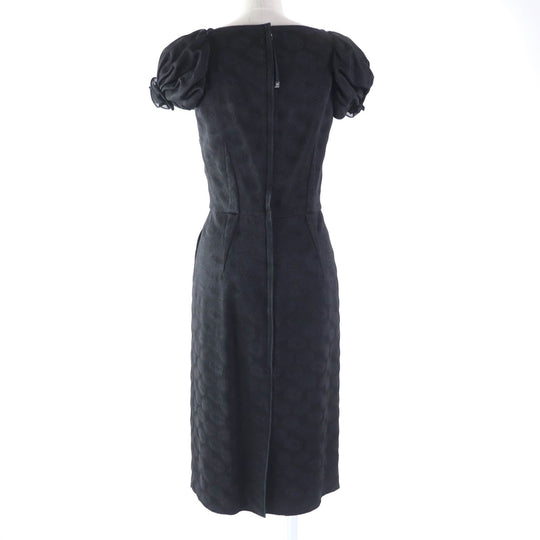 DOLCE&GABBANA one piece Outer: 79% acetate, Outer: 18% nylon, Outer: 3% elastane (polyurethane), Lining: 78% acetate, Lining: 16% nylon, Lining: 6% elastane black Women 38 Used Authentic