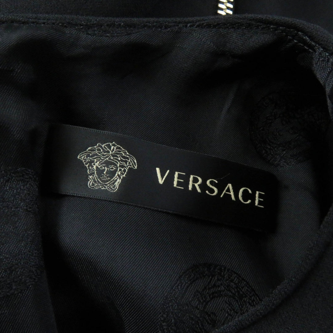 VERSACE one piece Outer material: 86% wool, Outer material: 10% silk, Outer material: 2% polyurethane, Outer material: 2% nylon, Lining: 96% rayon black Women 40 Used Authentic