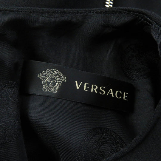 VERSACE one piece Outer material: 86% wool, Outer material: 10% silk, Outer material: 2% polyurethane, Outer material: 2% nylon, Lining: 96% rayon black Women 40 Used Authentic