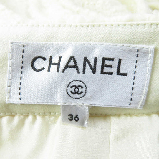 CHANEL Tweed skirt P59644 Outer: 88% wool, Outer: 7% polyamide (nylon), Outer: 5% silk, Lining: 100% silk, Part: 100% cotton Ivory Women 36 Used Authentic