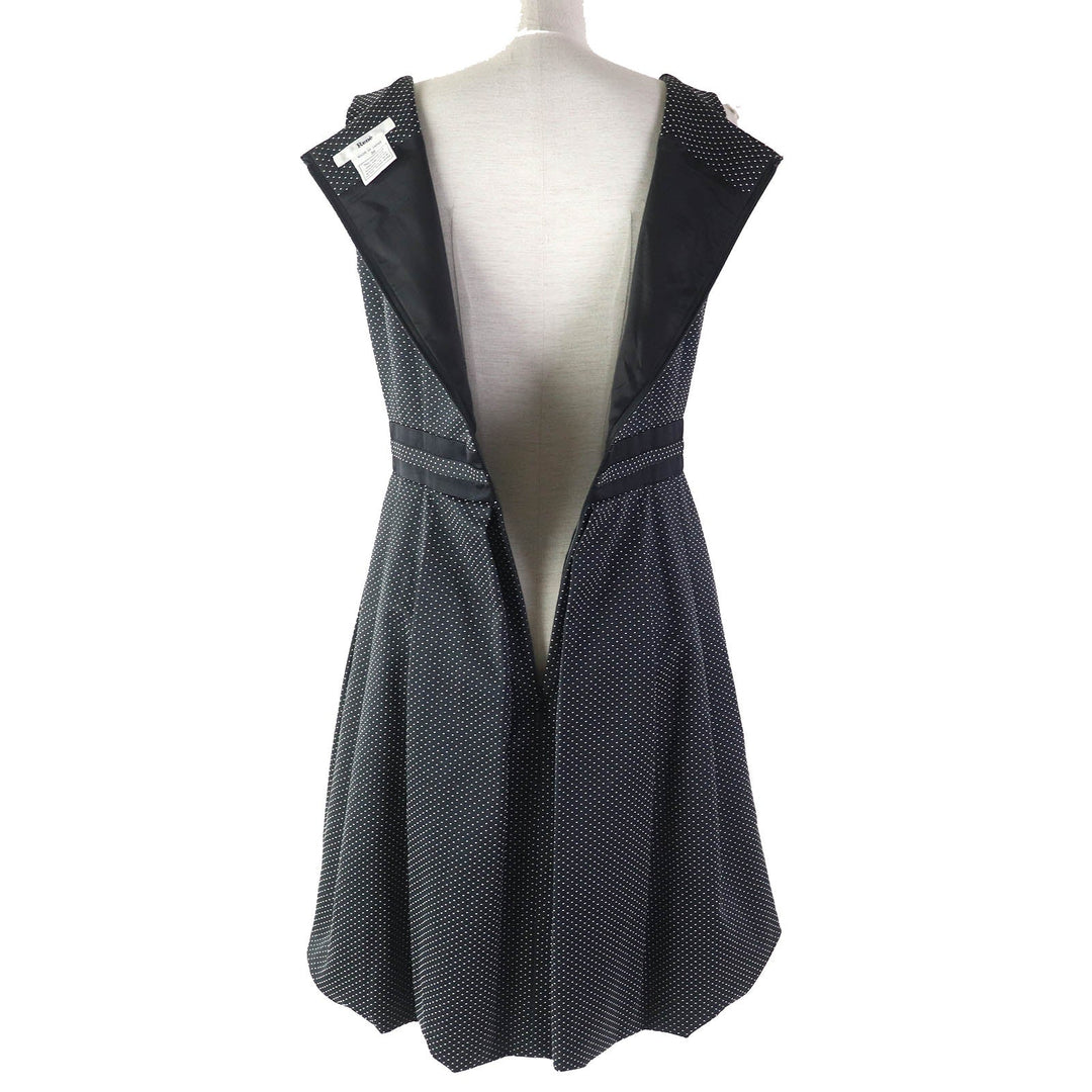 Rene one piece Outer material: 54% cotton, Outer material: 42% polyester, Outer material: 4% polyurethane, Lining: 100% cupra, Part: 60% rayon Black White Women 36 Used Authentic