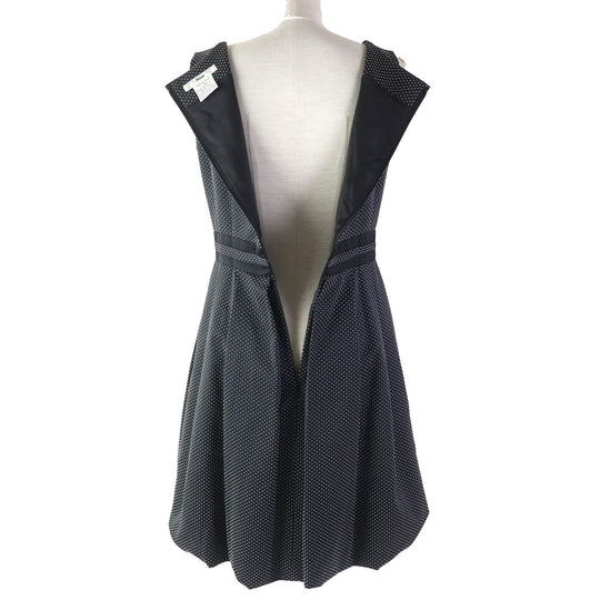 Rene one piece Outer material: 54% cotton, Outer material: 42% polyester, Outer material: 4% polyurethane, Lining: 100% cupra, Part: 60% rayon Black White Women 36 Used Authentic