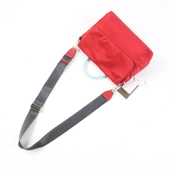 russet Handbag Outer: Nylon, PVC backing Lining: Cotton Leather: Cowhide Red light blue THE CLOUDS NYLON Women Used Authentic