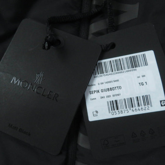 MONCLER Down jacket Outer: 100% nylon; Back: 100% polyester; Lining: 100% polyester; Hood lining: 100% polyester; Hood section: 100% nylon; Other fabric: 100% polyester; Filling: 90% down, 10% feather black SEPIK Women 1 Used Authentic