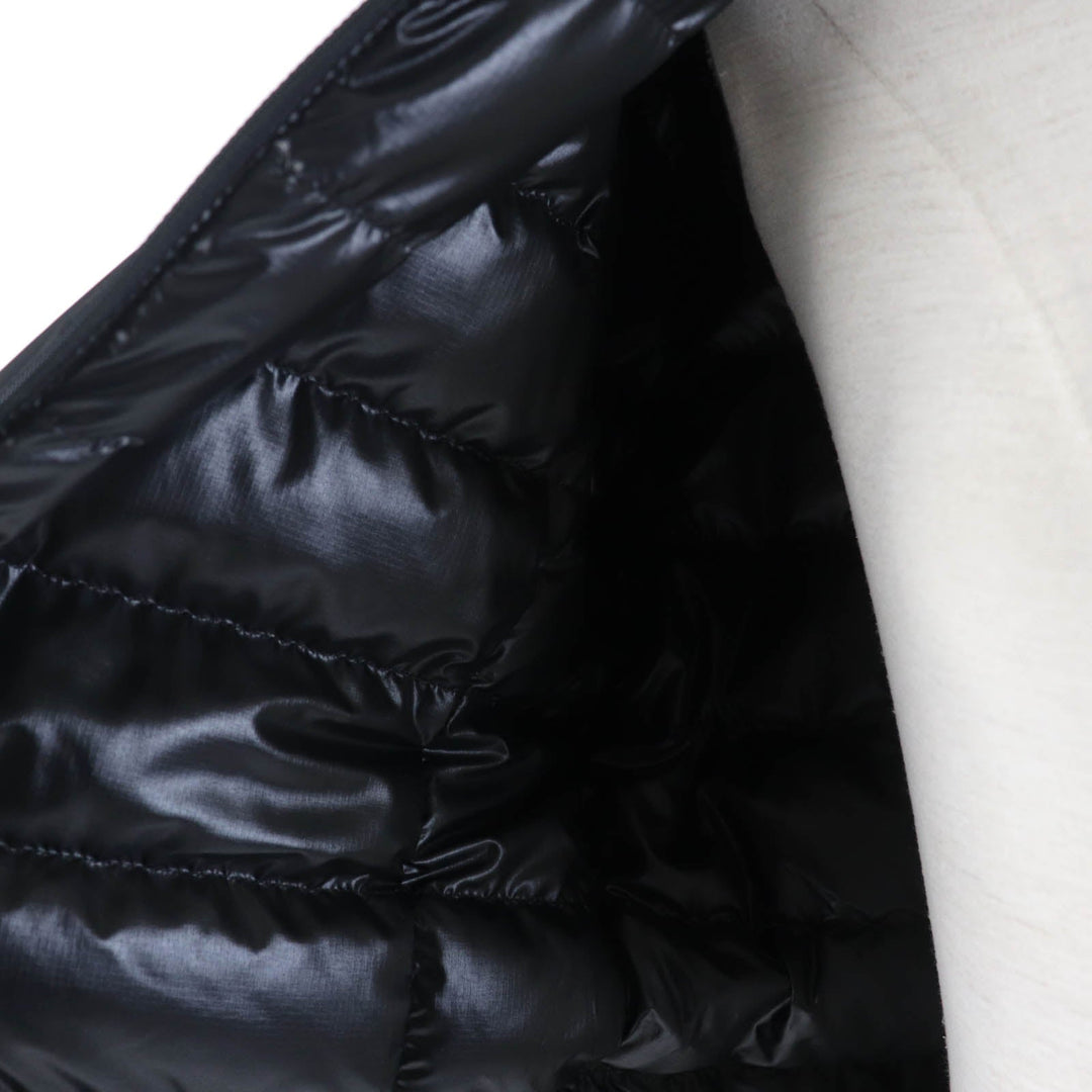 MONCLER Down jacket Outer: 100% nylon; Back: 100% polyester; Lining: 100% polyester; Hood lining: 100% polyester; Hood section: 100% nylon; Other fabric: 100% polyester; Filling: 90% down, 10% feather black SEPIK Women 1 Used Authentic